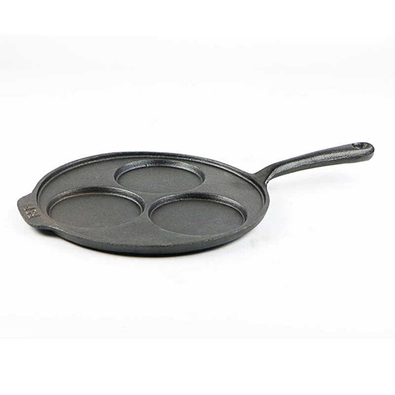 Three-hole Cast Iron Frying Pan With Eggs 1 Three-hole Cast Iron Frying Pan With Eggs 1